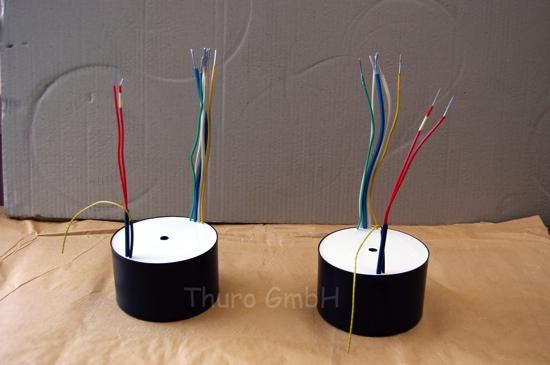 Casted toroidal transformer with HF braid